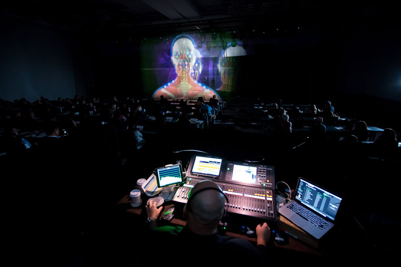 Technology team member monitoring the hologram presentation during a live event