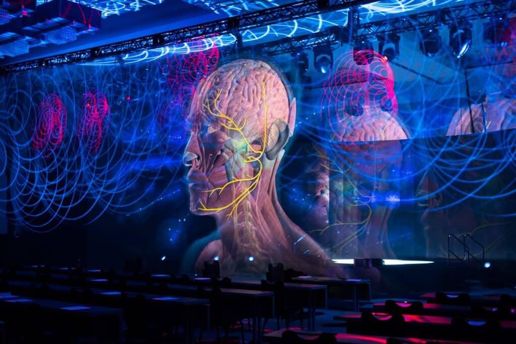 Impressive tech trend of a human head hologram projected on stage for a live event