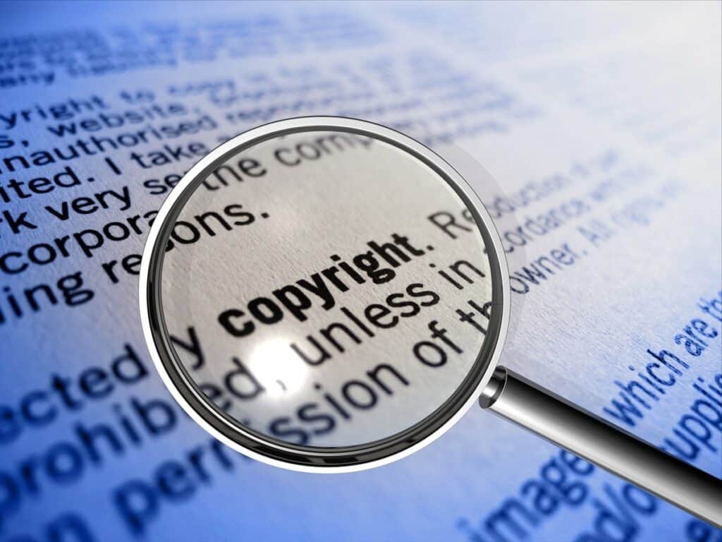 copyright laws research papers, the word copyright under a magnifying glass