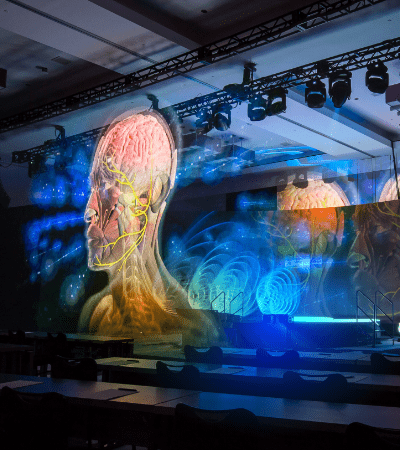 Hologram image of a human head projected on stage for an event